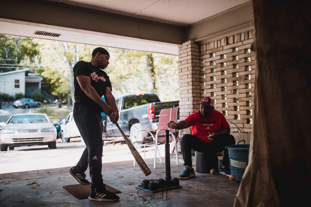 Tyler training with his father, Dexter. Photographed by iSmooth.